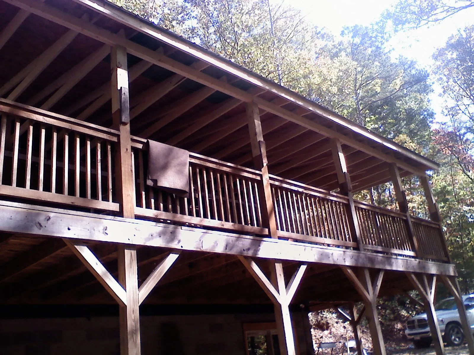 Timber framing under a new elevated porch and deck — Roof Leak Repair in Portal by Roofing Brothers